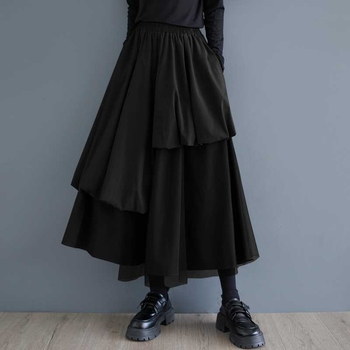 Mrežasta suknja s nepravilnim krojem, srednja duljina, uredski stil