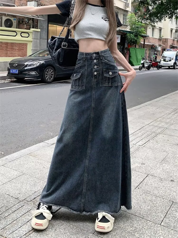 Denim suknja visokog struka i sirov rub, detalji kolage šivanja, duga silueta, mikro-elastičan materijal s 30–50% poliestera