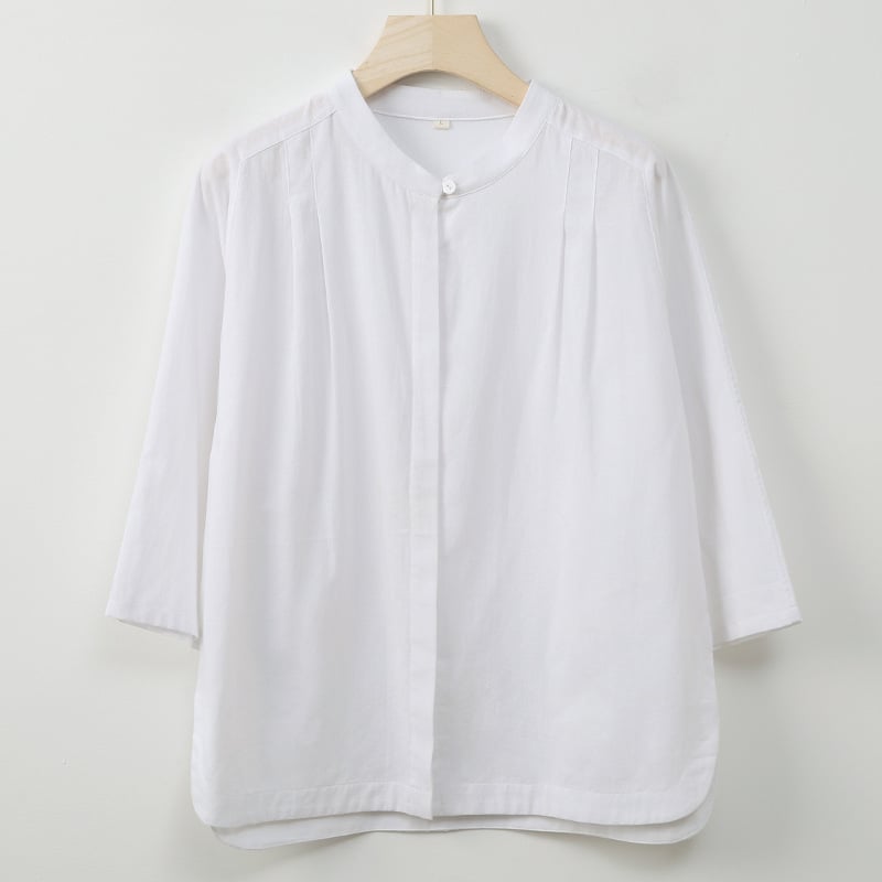 Ženska košulja: pamuk; imitacija ramije, sand-washed; stojeći ovratnik; rukav 3/4; kopčanje na jedan red gumba