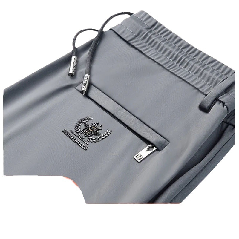 Muške sportske hlače za svakodnevnu upotrebu, s visokim elastičnim pojasom, ravnog kroja, duge, materijal: poliester‑mješavina (90% poliester)