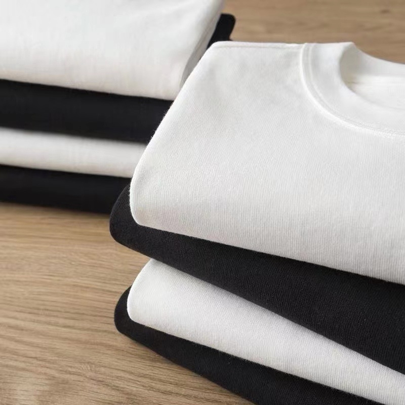 Tricou din bumbac 95% cu imprimeu cu logo, croială lejeră, guler rotund, mâneci scurte