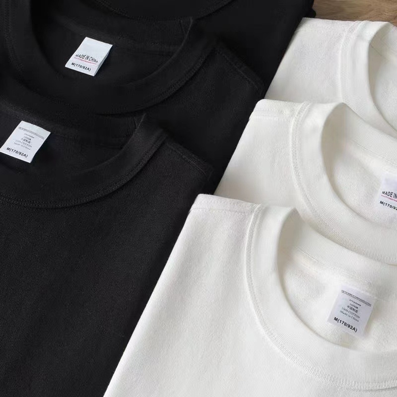 Tricou din bumbac 95% cu imprimeu cu logo, croială lejeră, guler rotund, mâneci scurte