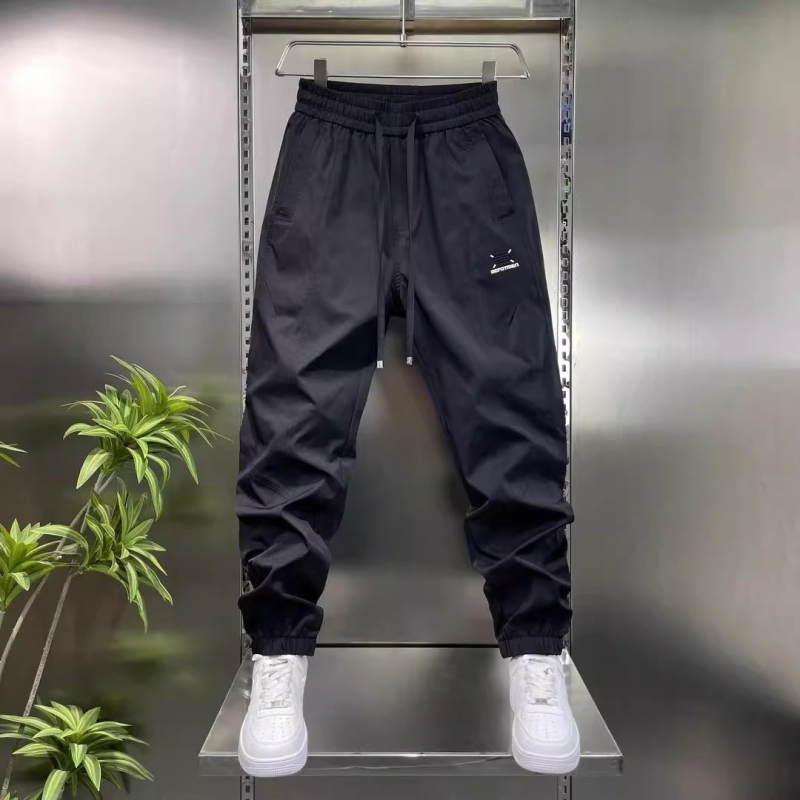 Muške jesenske casual hlače slim-fit od poliestera, srednji pojas, vezivanje, ravni kroj