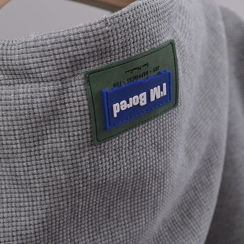 Ženska pamukasta vest s kapuljačom - tekstualni uzorak, srednja duljina, pulover stil