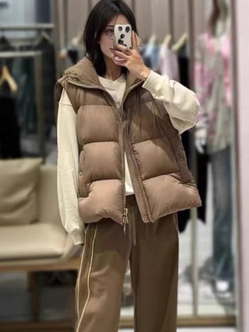 Női kapucnis tollmellény, töltet duck down 81–85%, laza szabás, cipzár, hossz 50–65 cm