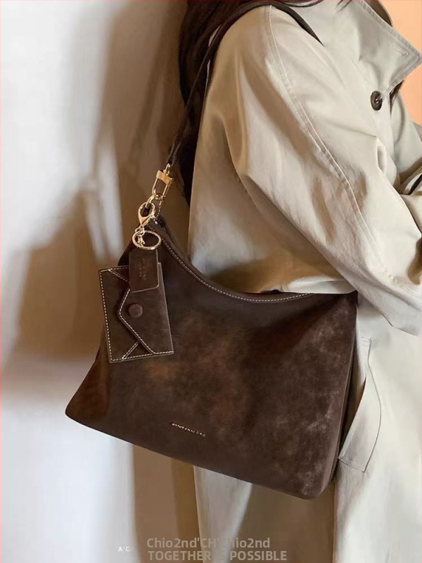 Kožna podlaktna torbica s zatvaračem, vodoravnog kvadratnog oblika, unutarnja džep s zatvaračem, jedna naramenica