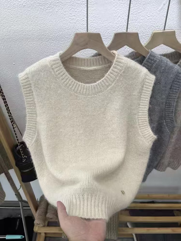 Ženski pleteni prsluk od alpaka vune, bez rukava, pulover-stil, okrugli izrez, jednobojni uzorak, duljina 50–65 cm, regular fit, proljetna 2025