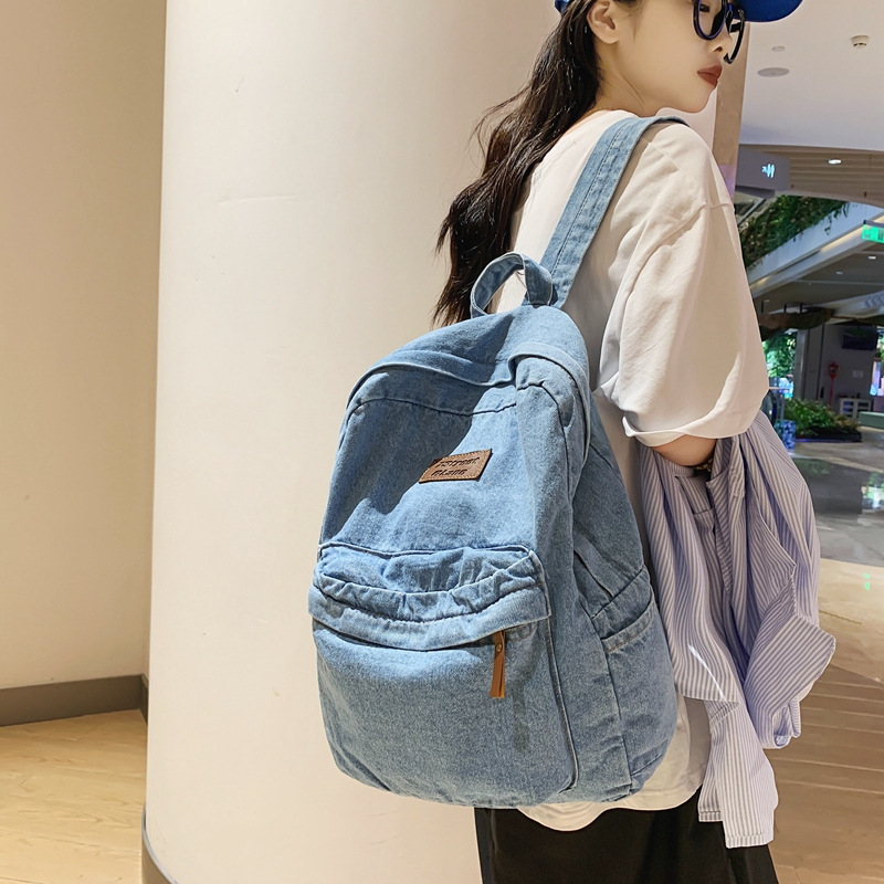 Denim iskolatáska utcai trenddel, cipzáras záródás, telefonzseb, őszi 2024