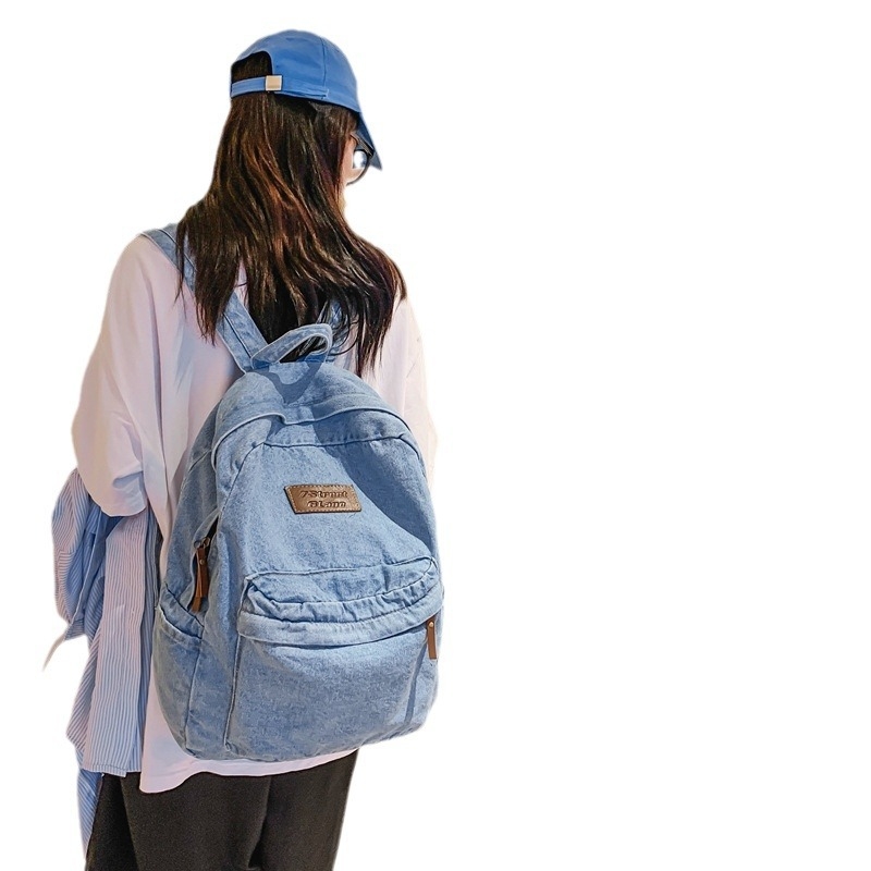 Denim iskolatáska utcai trenddel, cipzáras záródás, telefonzseb, őszi 2024