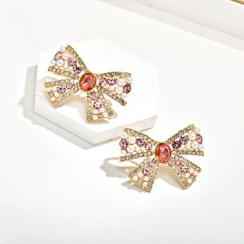 Naušnice s mašnicom od kristala, miješani materijali; kristalni završetak; stil lagani luksuz; za žene.