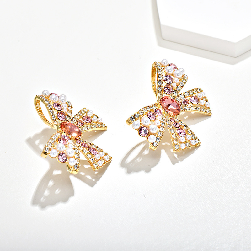 Naušnice s mašnicom od kristala, miješani materijali; kristalni završetak; stil lagani luksuz; za žene.