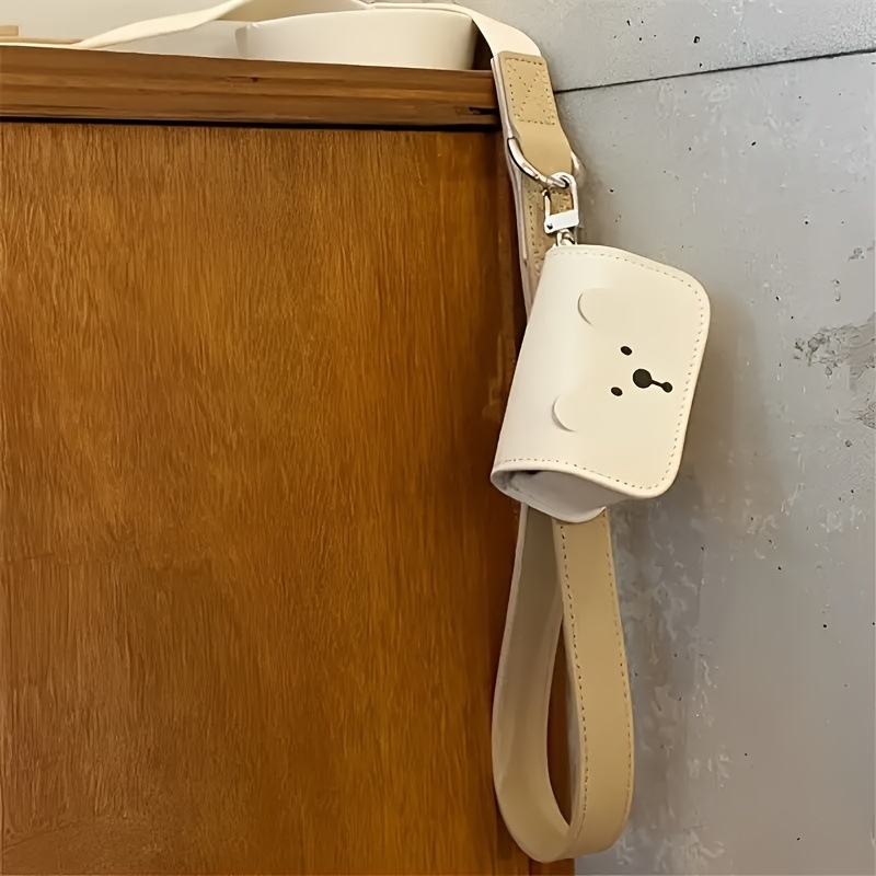 Δερμάτινη τσάντα για βόλτες με σκύλο, διανομέας σακουλών αποβλήτων με διαχείριση συνεχούς ροής — σχέδιο αρκούδας