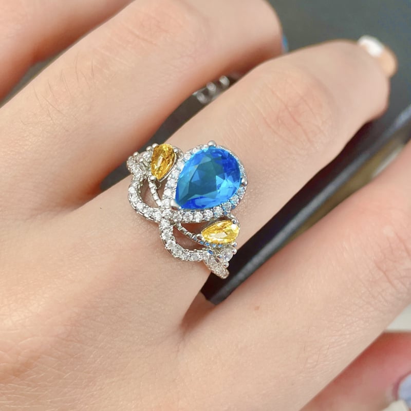 Bakreni prsten, kapljasti oblik, postavljanje krune, London blue topaz, dijamantno brušenje