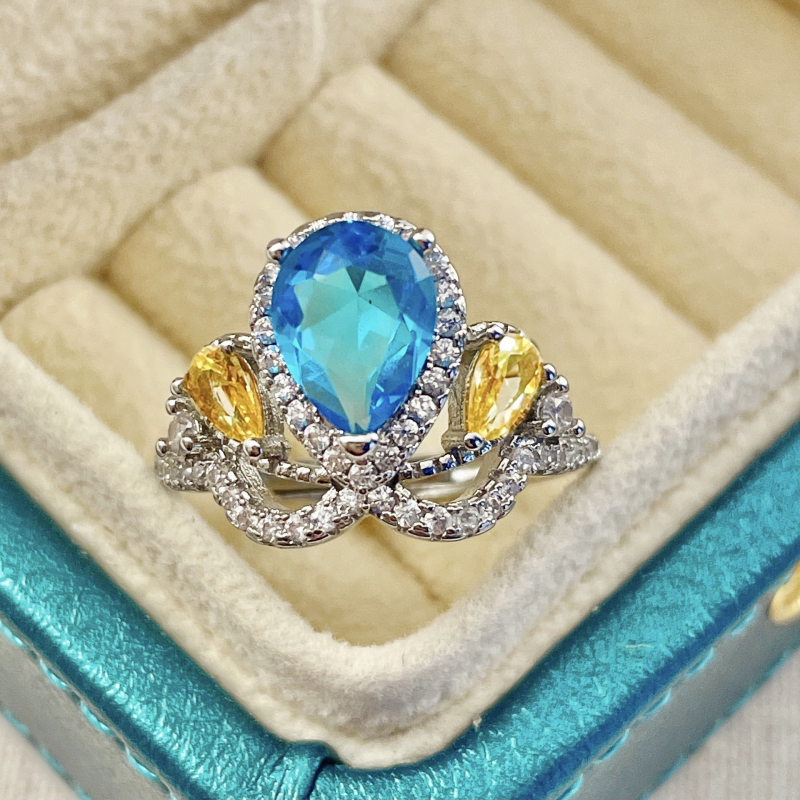 Bakreni prsten, kapljasti oblik, postavljanje krune, London blue topaz, dijamantno brušenje
