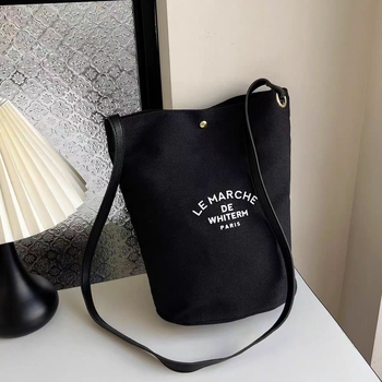 Ženska bucket torba od platna, gradski minimalistički stil, bucket tip, magnetsko zatvaranje