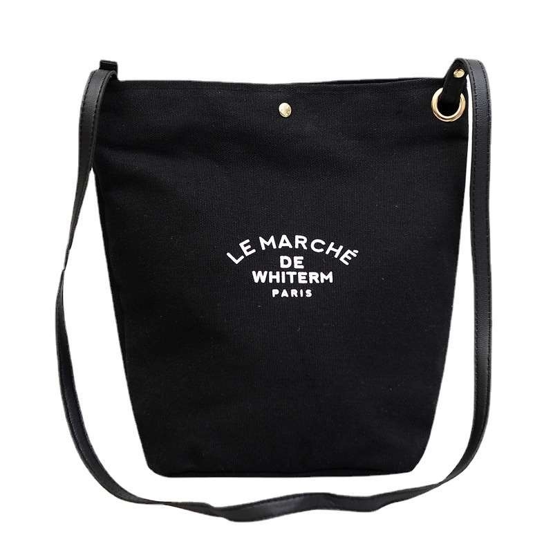 Ženska bucket torba od platna, gradski minimalistički stil, bucket tip, magnetsko zatvaranje