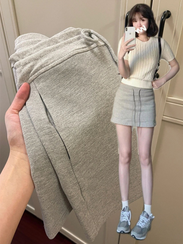 Suknja A-linije, kratka, mješavina pamuka i poliestera, jednobojni uzorak, poslovni stil