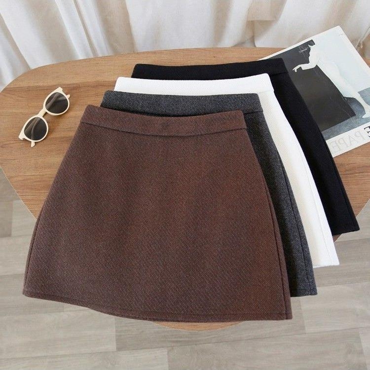 Pola s visokim strukom i A-krojem, pamuk-poliester smjesa, zatvarač, mikroelastičnost, gradski stil