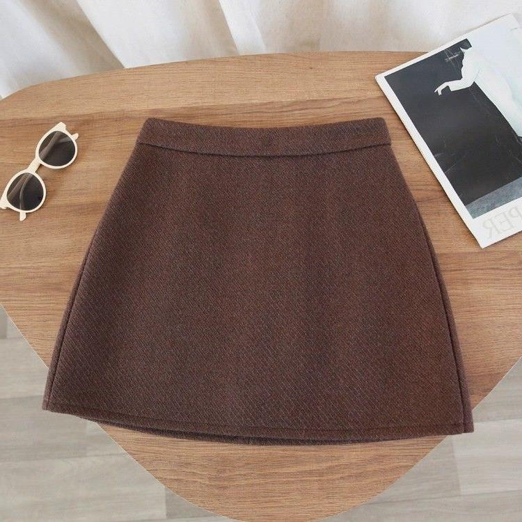 Pola s visokim strukom i A-krojem, pamuk-poliester smjesa, zatvarač, mikroelastičnost, gradski stil