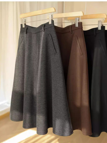 Vunena kišobran suknja, visoki pojas, srednja duljina, debela flis podstava, jednobojna, mikroelastična, acetatni sadržaj