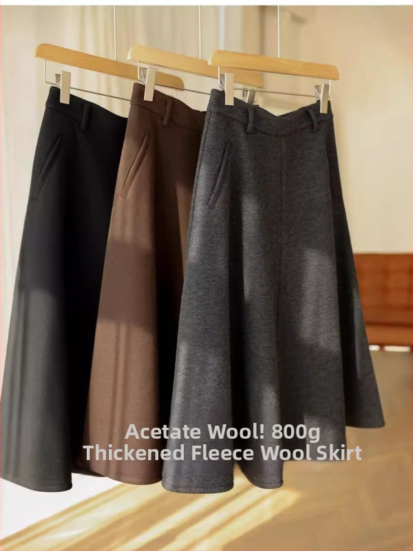 Vunena kišobran suknja, visoki pojas, srednja duljina, debela flis podstava, jednobojna, mikroelastična, acetatni sadržaj