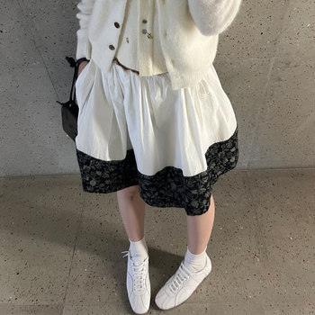 Tiffesini kolegijski stil plisirana kratka suknja s patchworkom prugasto/kockasto — pamukova smeša, 50–70% pamuka, zima 2025