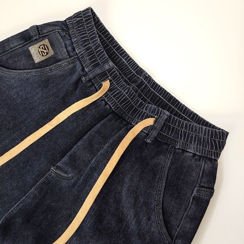 Muške traperice s flis predloškom, pamuk, uski kroj, srednja struka, zip zatvarač, izšivanje