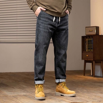 Muške traperice od denima, isprane, široki kroj, srednje visoki pojas, gusta tkanina, elastičnost