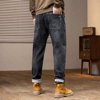 Muške traperice od denima, isprane, široki kroj, srednje visoki pojas, gusta tkanina, elastičnost