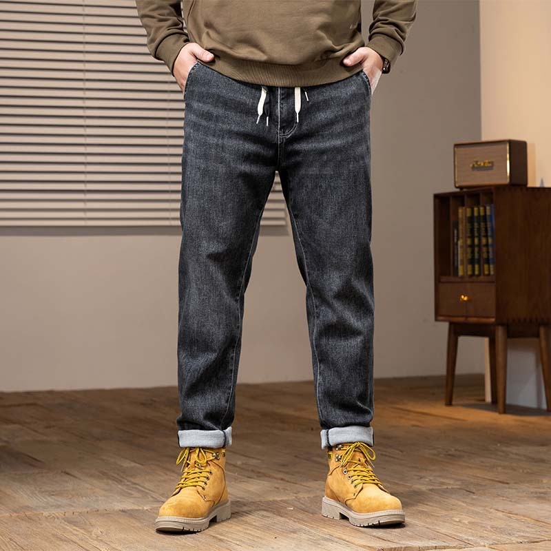 Muške traperice od denima, isprane, široki kroj, srednje visoki pojas, gusta tkanina, elastičnost