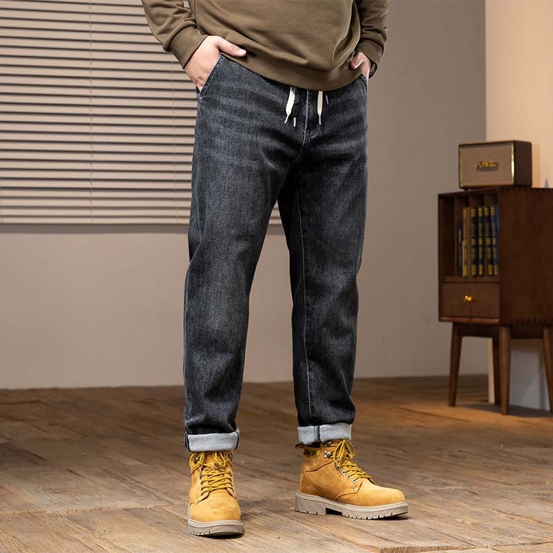 Muške traperice od denima, isprane, široki kroj, srednje visoki pojas, gusta tkanina, elastičnost