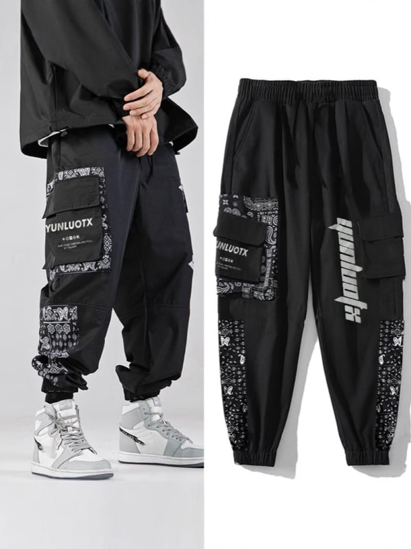 Sportske hlače u opuštenom kroju, brzo se sušećim materijalom, tanke tkanine, srednje visoki pojas, print dizajn za ljeto