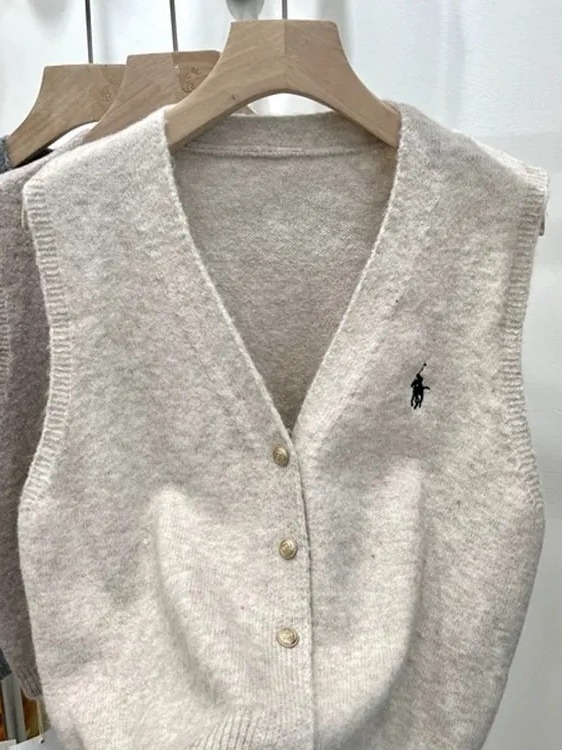 Ženski vest-kardigan s V izrezom, kašmirna mješavina s elastanom i poliesterom, duljina 50–65 cm, kopčanje u jednom redu