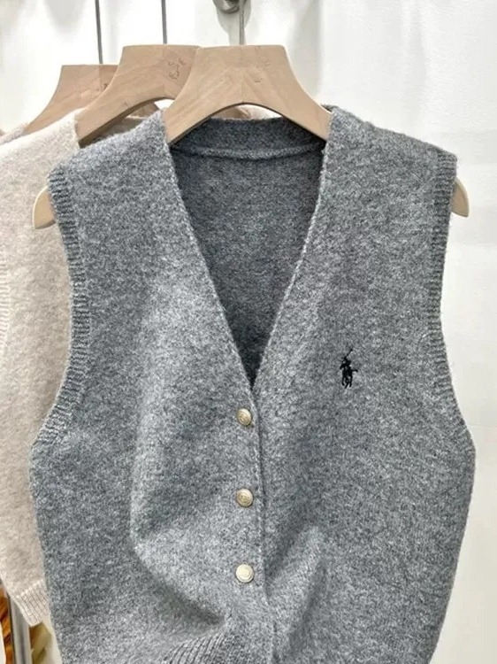 Ženski vest-kardigan s V izrezom, kašmirna mješavina s elastanom i poliesterom, duljina 50–65 cm, kopčanje u jednom redu