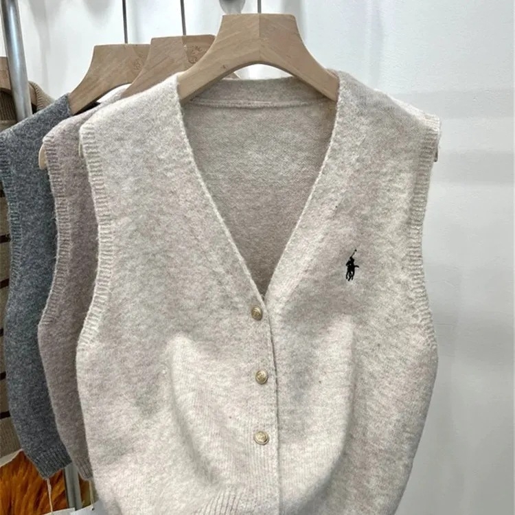 Ženski vest-kardigan s V izrezom, kašmirna mješavina s elastanom i poliesterom, duljina 50–65 cm, kopčanje u jednom redu