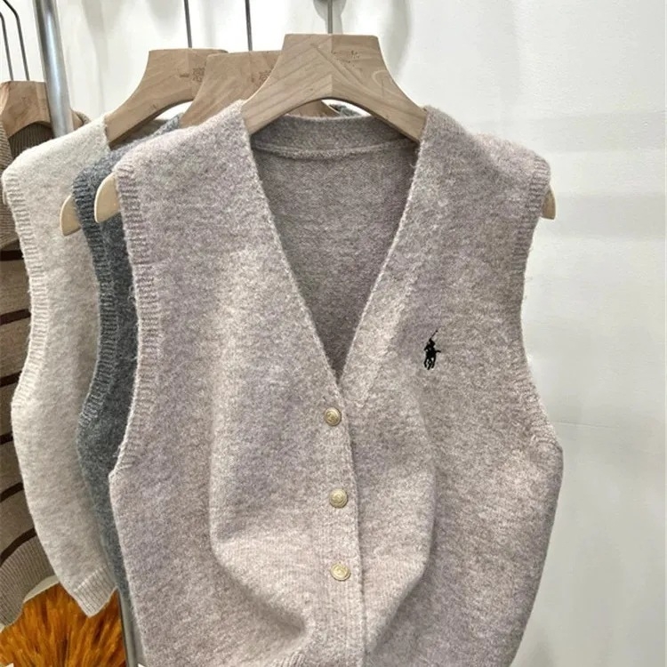 Ženski vest-kardigan s V izrezom, kašmirna mješavina s elastanom i poliesterom, duljina 50–65 cm, kopčanje u jednom redu