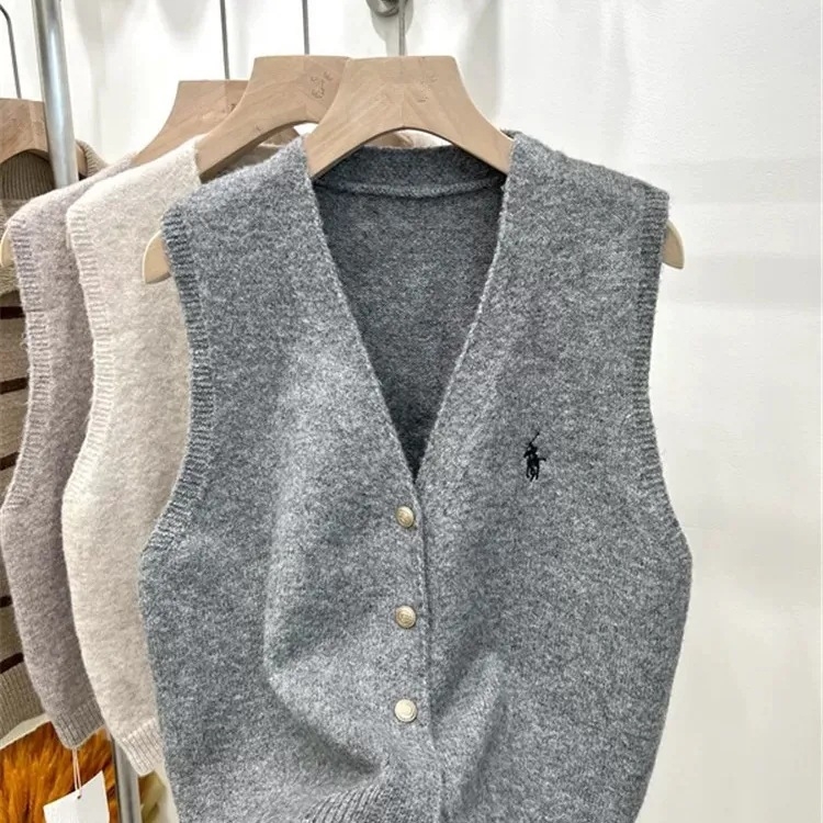 Ženski vest-kardigan s V izrezom, kašmirna mješavina s elastanom i poliesterom, duljina 50–65 cm, kopčanje u jednom redu
