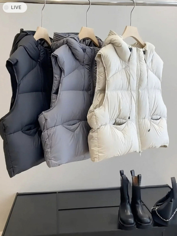 Női tollas mellény libatoll töltéssel, 81–85% tolltartalom, nylon anyag, kapucnival és cipzárral