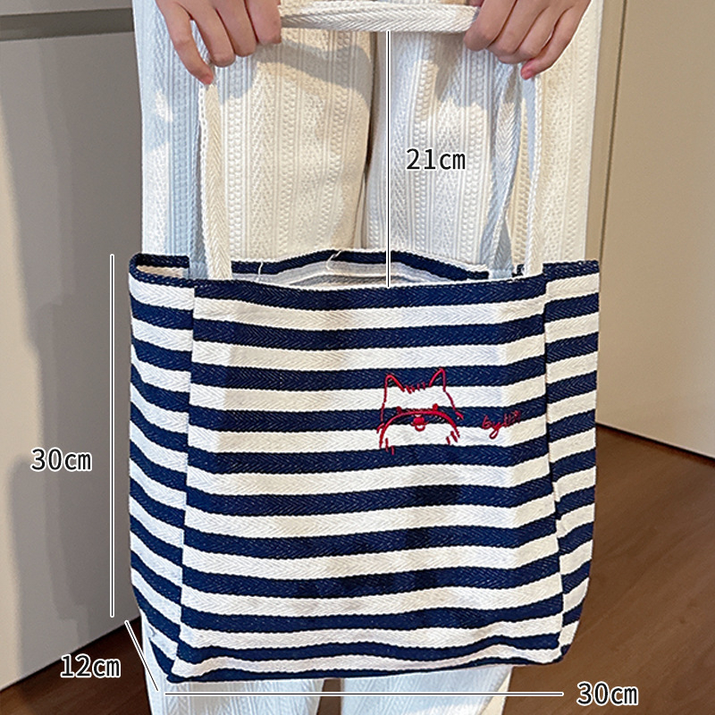 Csíkos vászon tote táska, fiatalos campus stílus, belső telefontartó zseb, dupla vállpánt, 2025 tavaszi kiadás