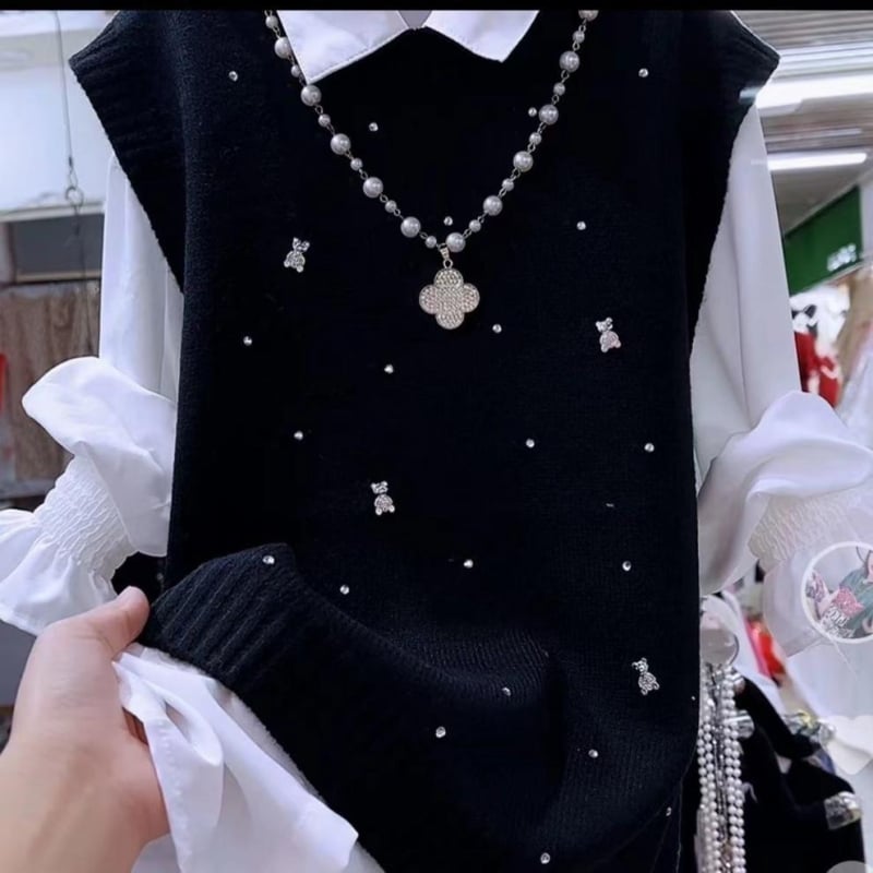 Női kötött mellény, V-nyakú, ujjatlan, egyszínű, őszi 2025