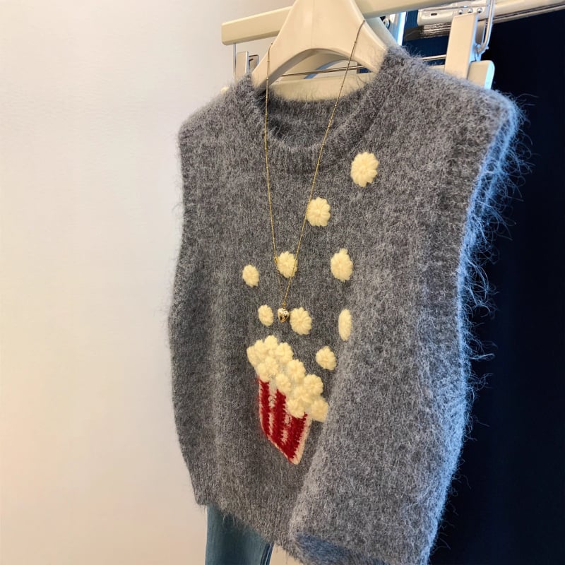 Női ujjatlan mellény kapucnival, kerek nyakú, laza szabású, kötött acril- és poliészter anyag