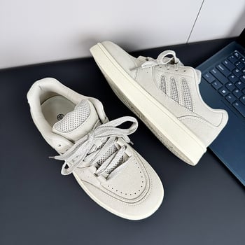 Muške tenisice s kožnim gornjim dijelom, gumena potplata, vezanje, niski kroj, prozračna mrežasta podstava