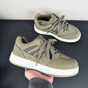 Muške tenisice s kožnim gornjim dijelom, gumena potplata, vezanje, niski kroj, prozračna mrežasta podstava