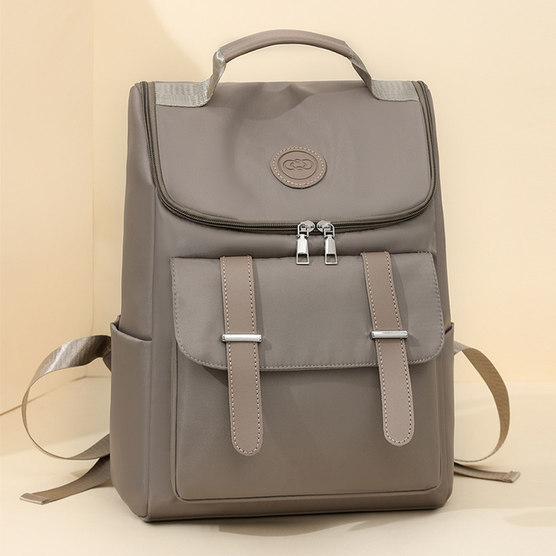 Ruksak urbano minimalističkog dizajna, Oxford tkanina, zatvaranje šnira, unutarnji laminirani džep na zip, poliester podstava, prozračan i otporan