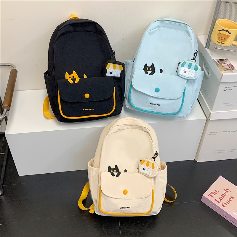 Unisex platnena školska torba — velika kapacità, prozračna i vodootporna, s jastučićem zraka na naramenicama, karikatura uzorak, podstava od poliesteru