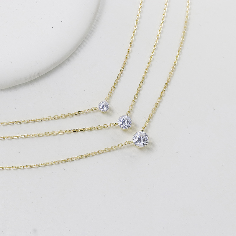 Dunli Jewelry Minimalistički lančić s jednim moissanitnim dijamantom, nevidljiva ugradnja, srebro 925, križni lanac