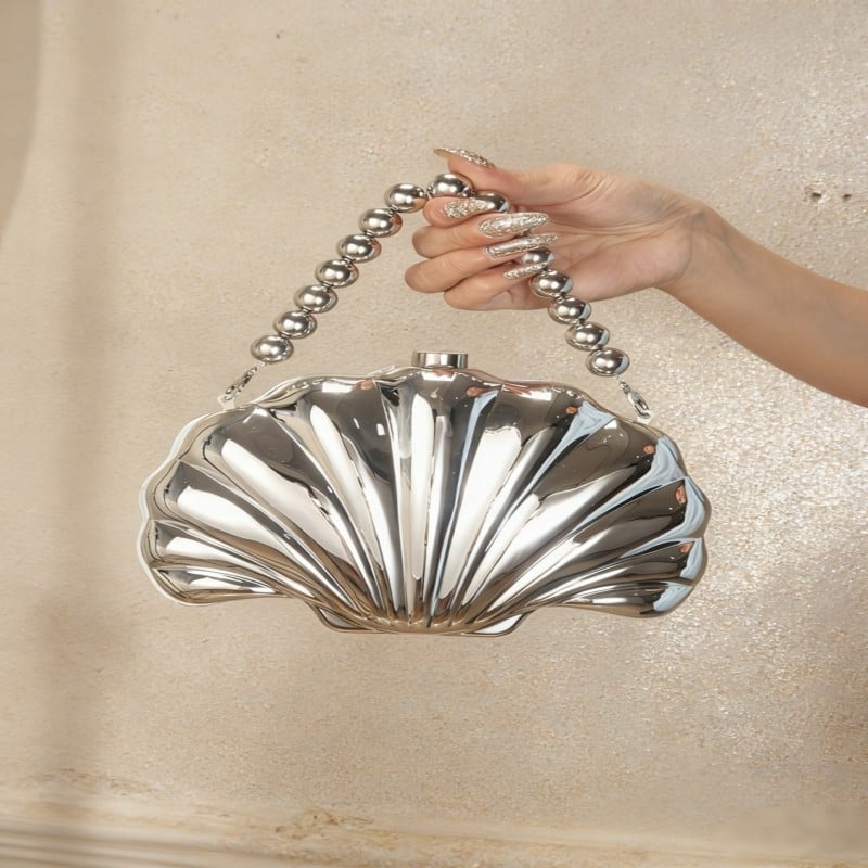 Estélyi táska kagyló alakú, dumpling forma, ABS anyagú, zárkapocs, bankett használatra