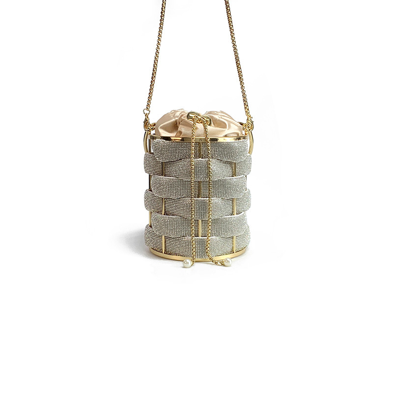 Ženska bucket torba od akrila, cilindrični oblik, zatvaranje šnurnom, unutarnji džepovi za telefon i ID, podstava od poliestera