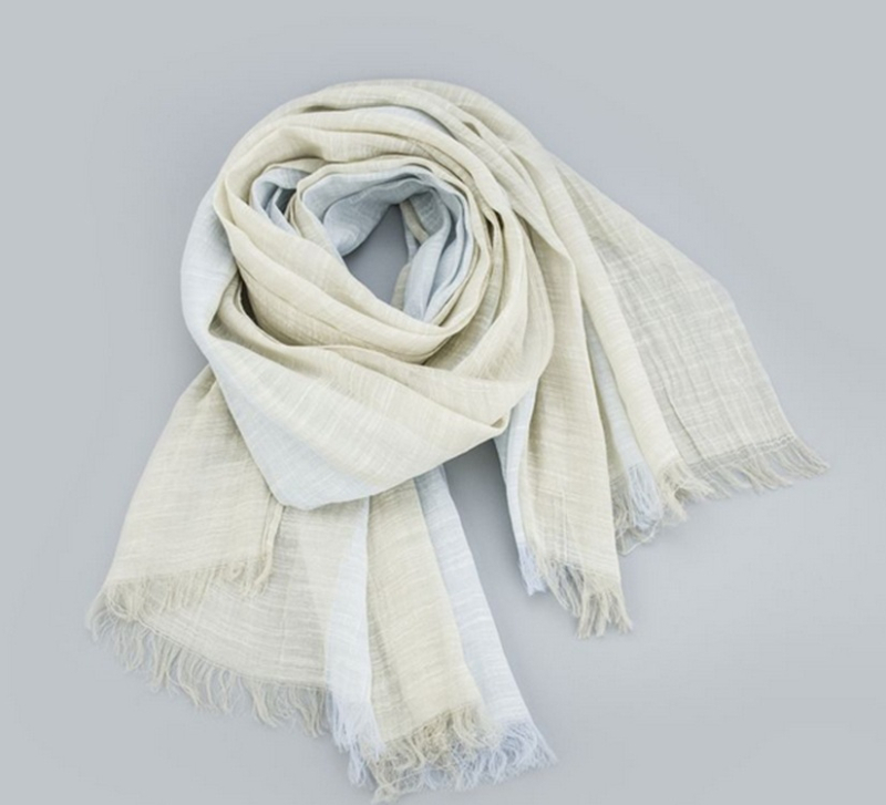 Sál poliészterből, egyszerű szövésű (plain weave), melegen tart, téli szezonra, nőknek