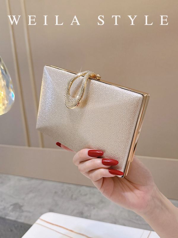 Női estélyi táska kemény héjjal és zár kristályokkal, doboz alakú, PU anyag, keresztpánt, poliészter bélés